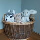 Very large oval laundry basket in two-tone braided wicker with handles
