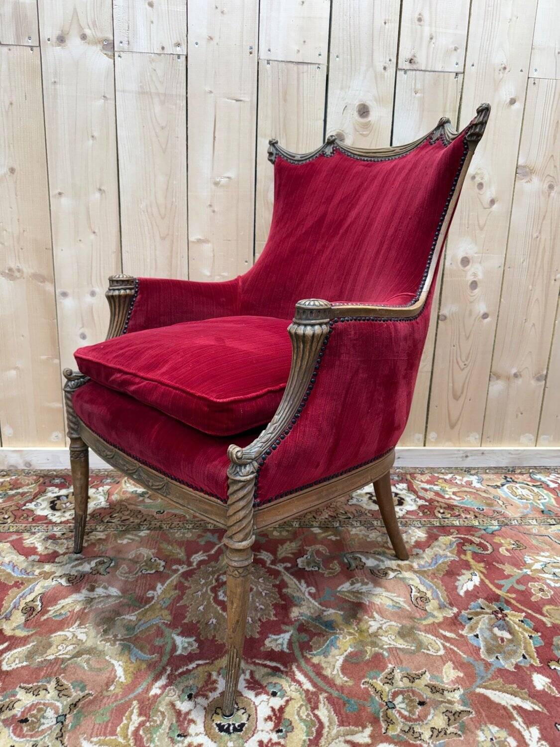 Art Nouveau gondola armchair – Carved wood & red theatre velvet – France