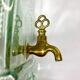Quadrangular glass fountain and brass tap