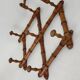 Bamboo-style wooden accordion coat rack