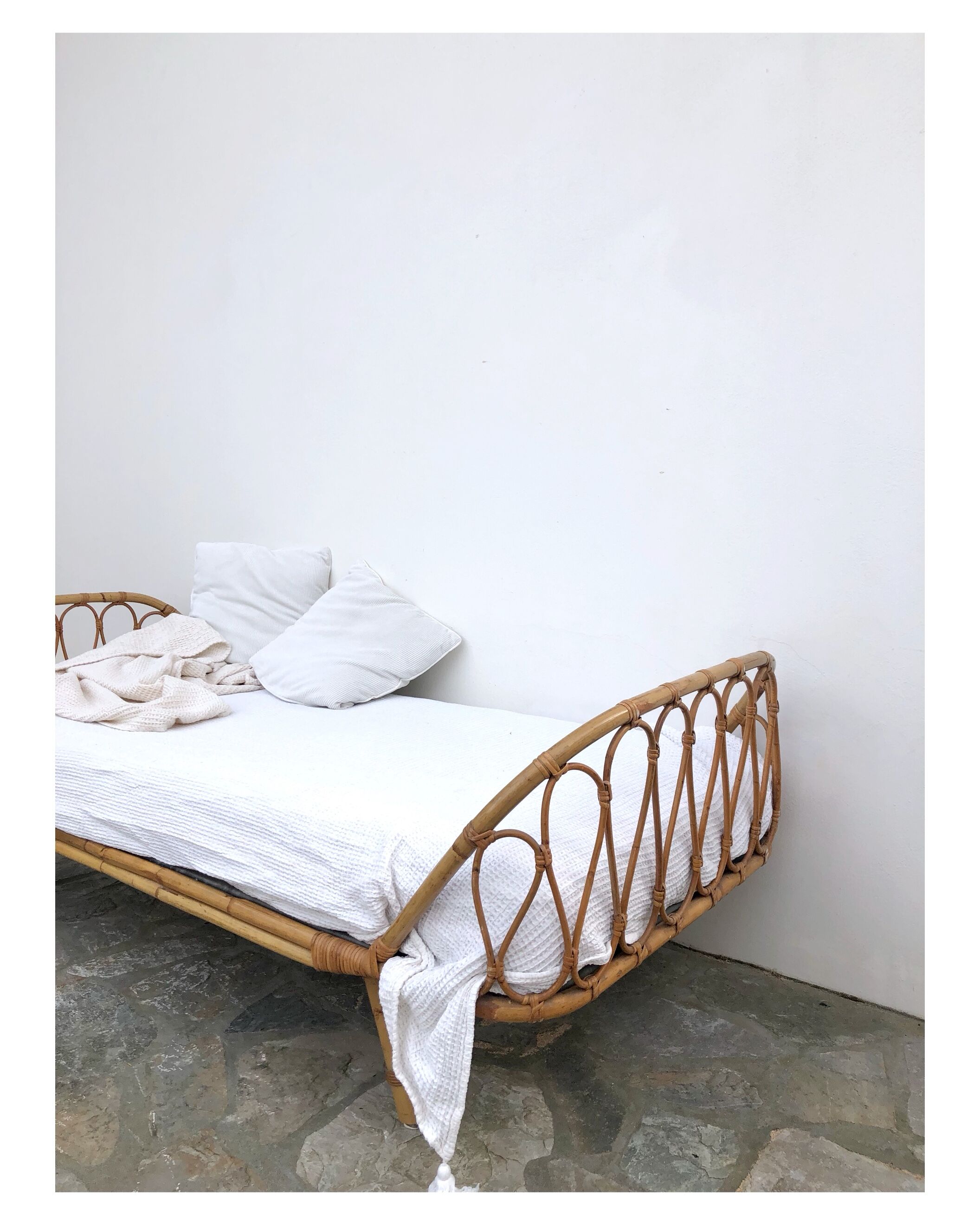 Vintage rattan bed