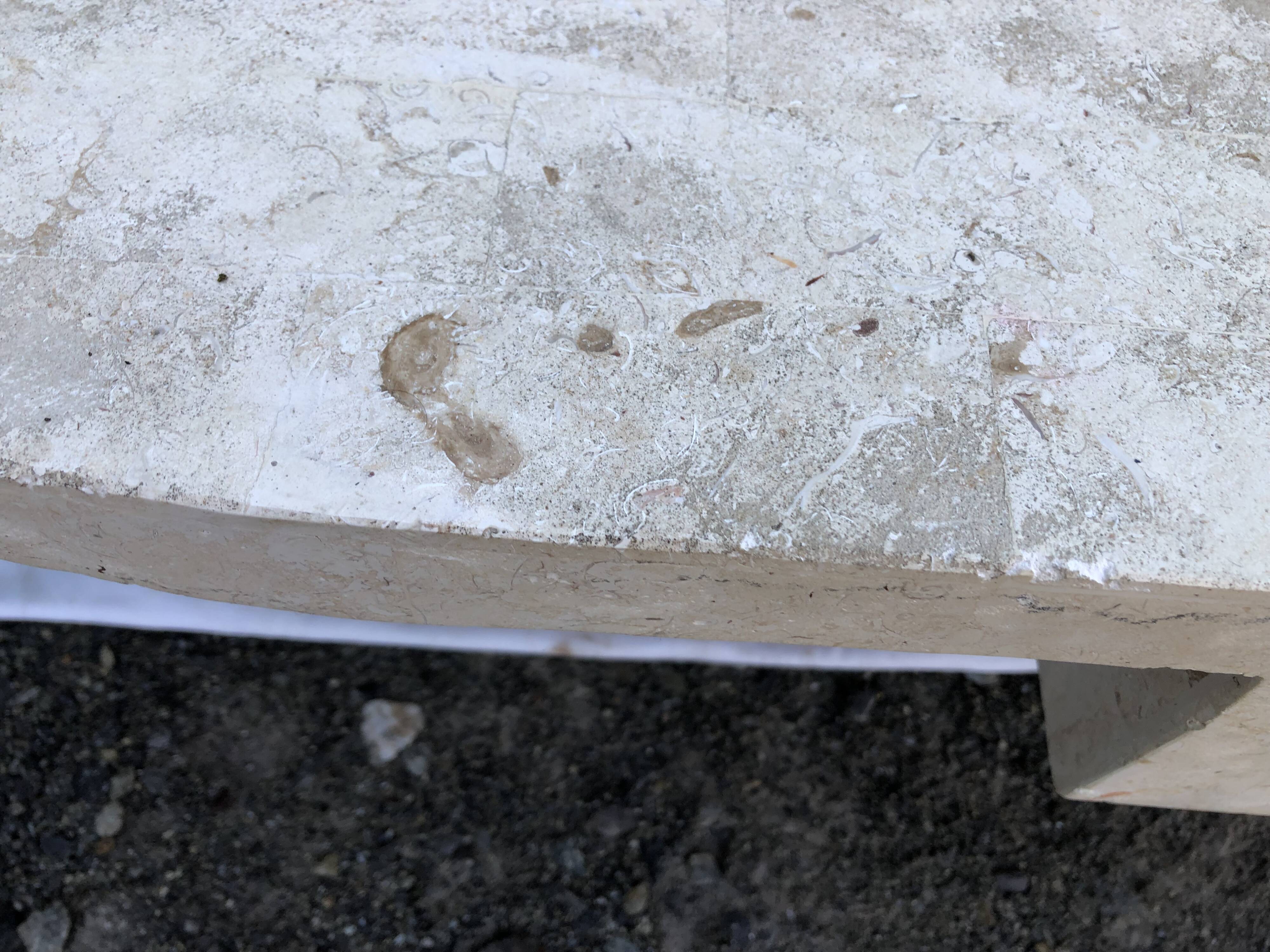 Vintage asymmetrical design coffee table in Mactan travertine stones by Magnussen ponte.