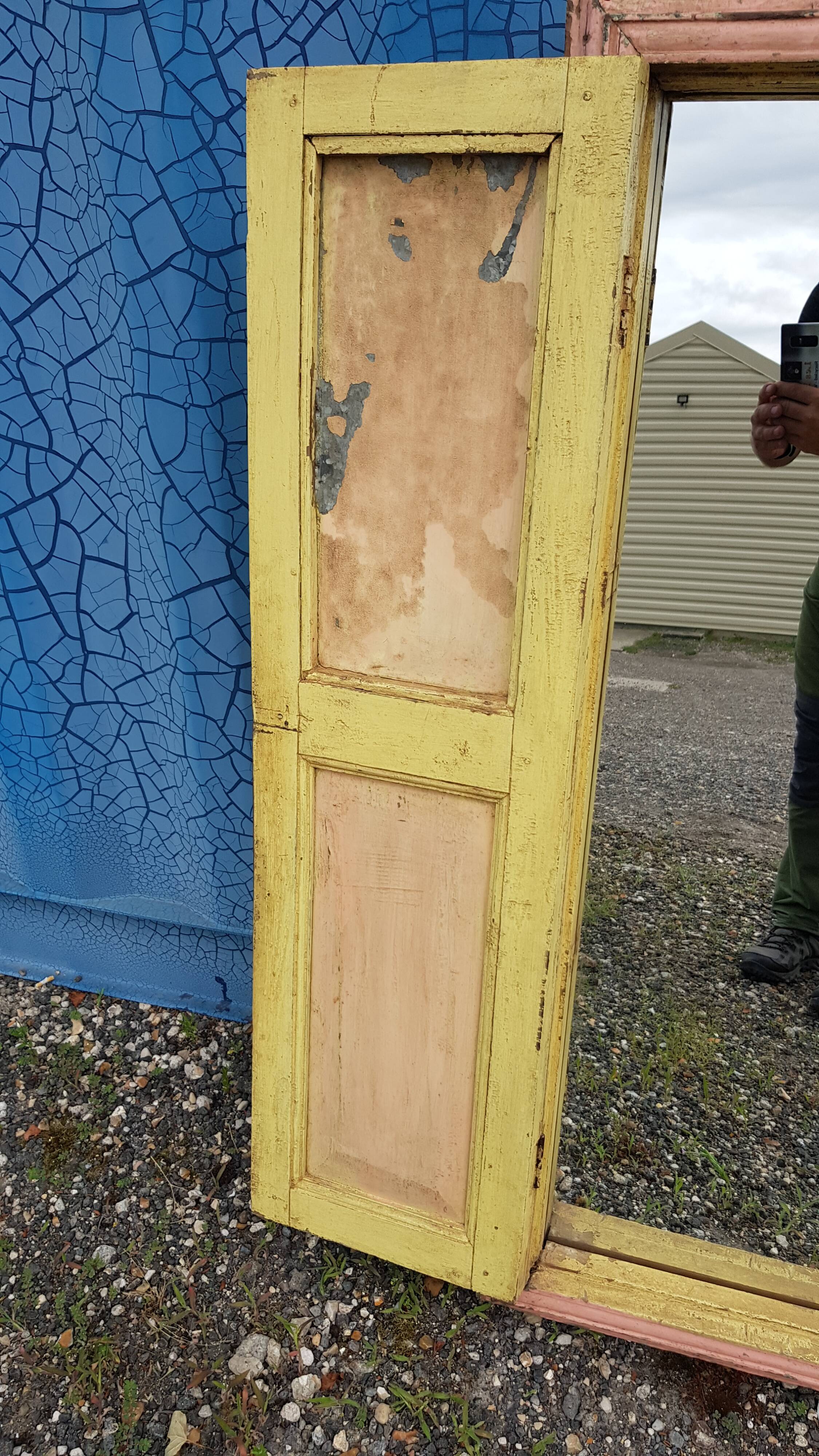 Old polychrome Burmese teak window with interior mirror.