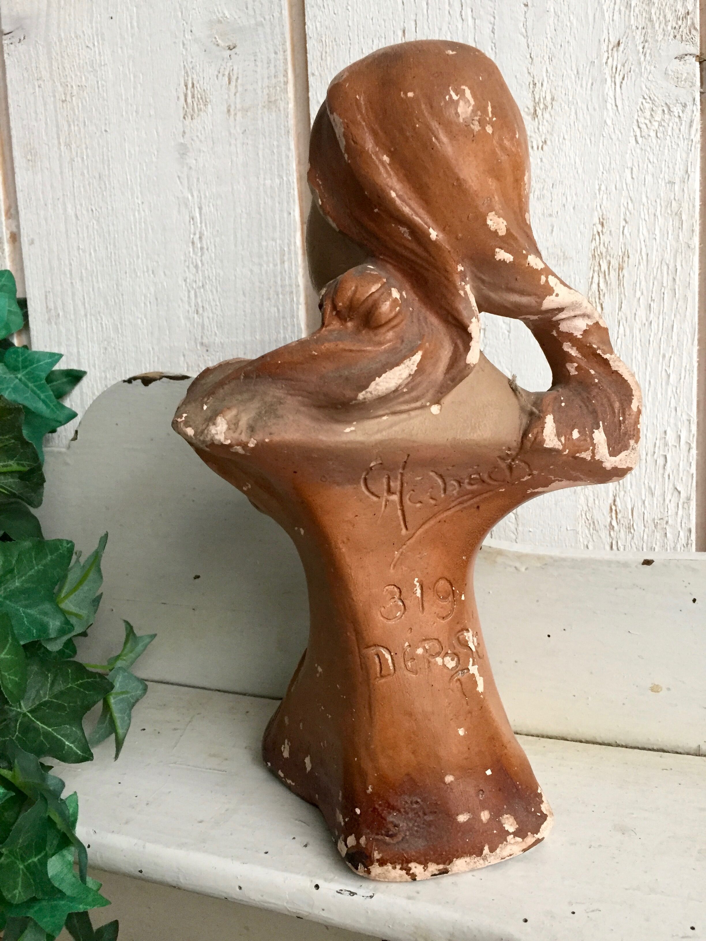 Monochrome plaster bust