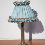 Brass lamp with vintage blue laminated lampshade