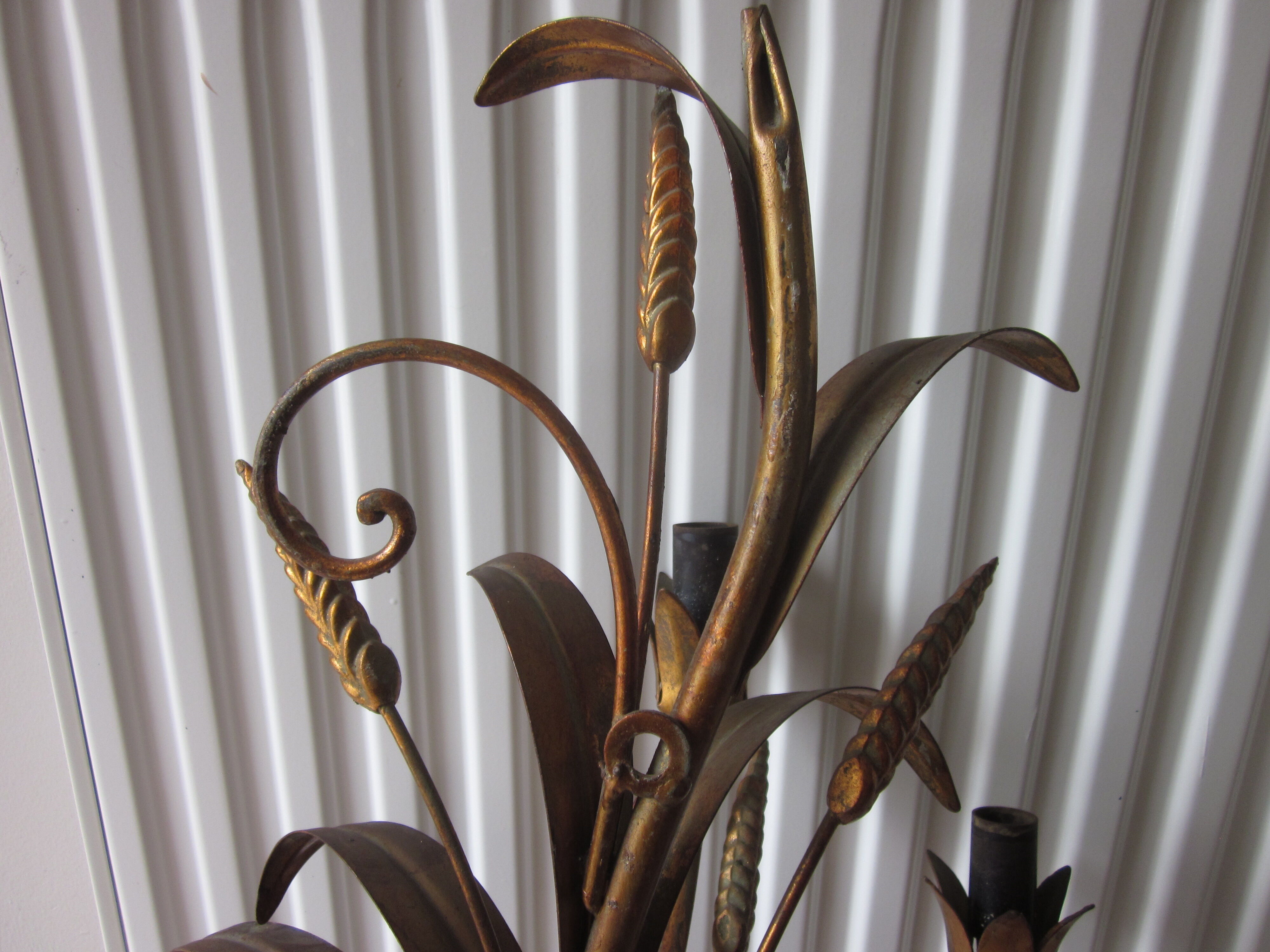 Sconce in gilded metal