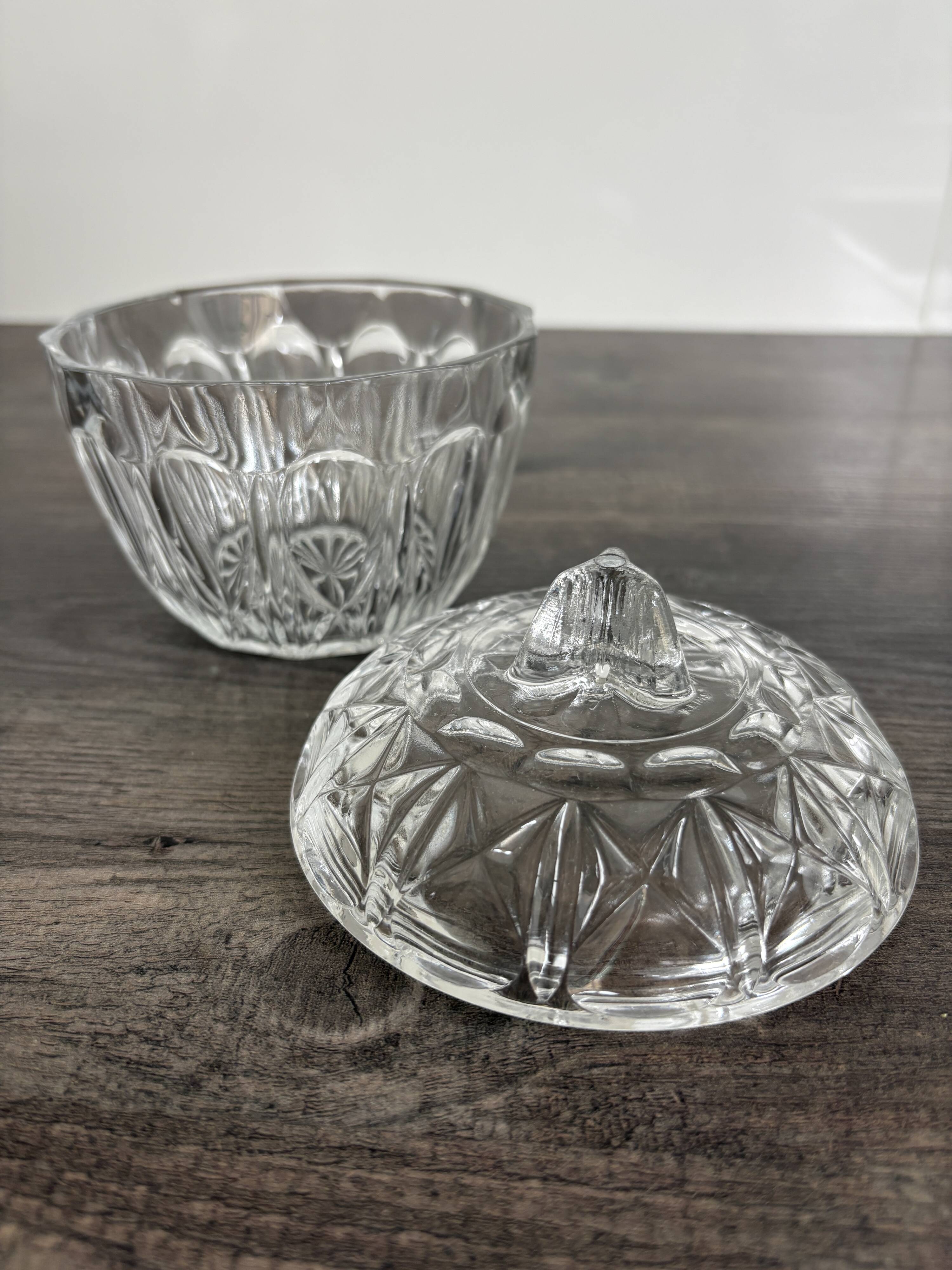 Antique covered jar in chiseled glass