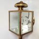 Brass and beveled glass lantern-like wall lamps in brass and beveled glass