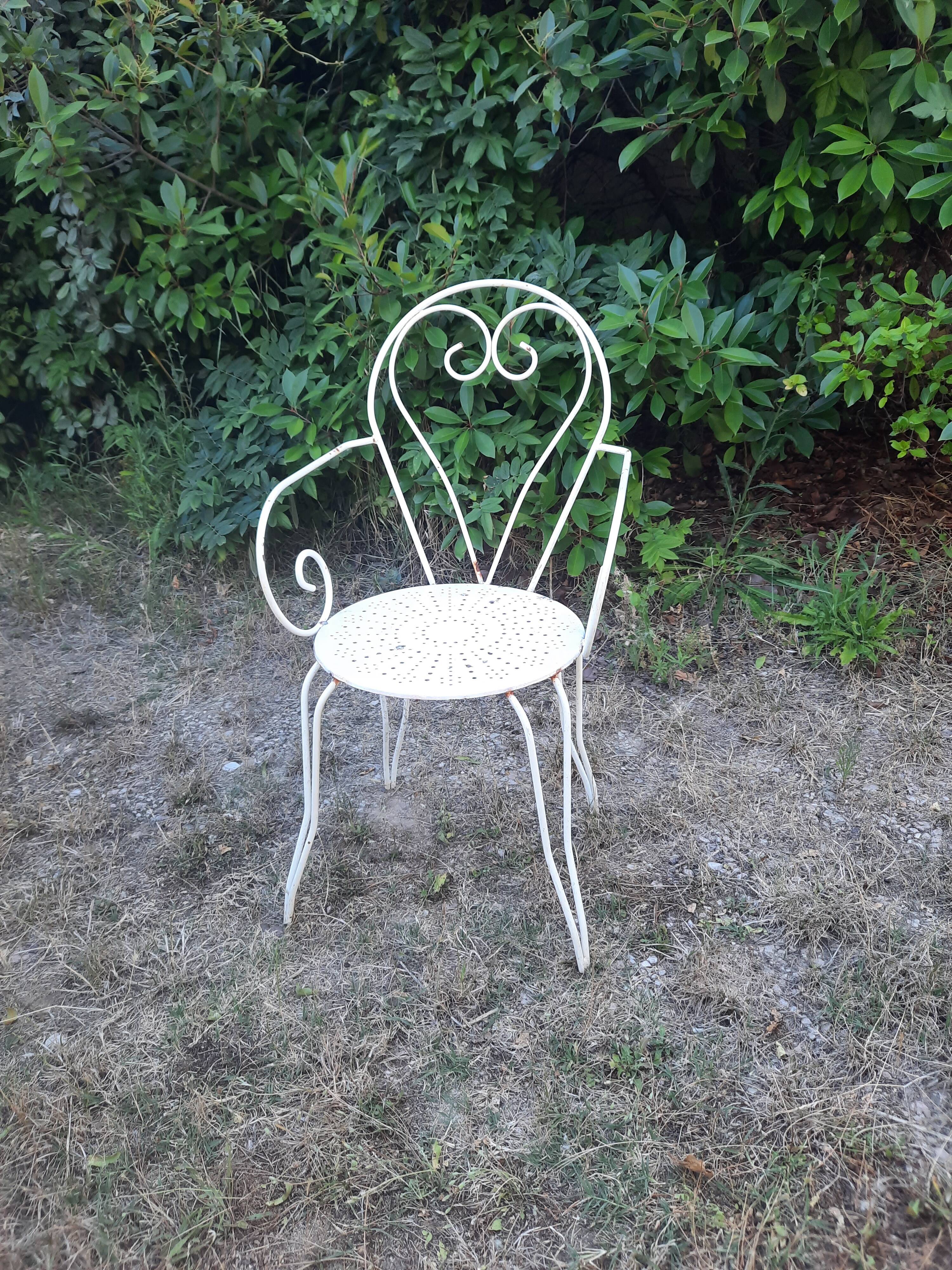 Antique wrought iron garden furniture