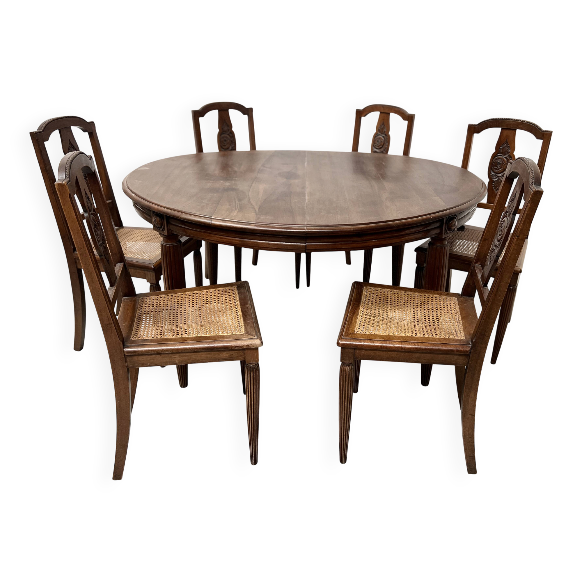 Art Deco table and six chairs in solid walnut, 20th century.