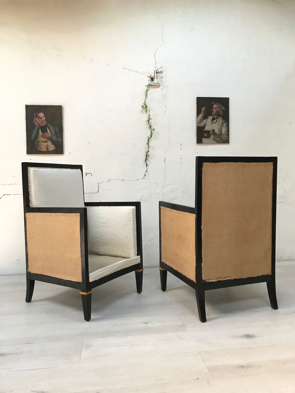 Pair of blackened wooden armchairs