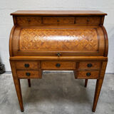 Cylinder desk with marquetry featuring a crosshatch design.