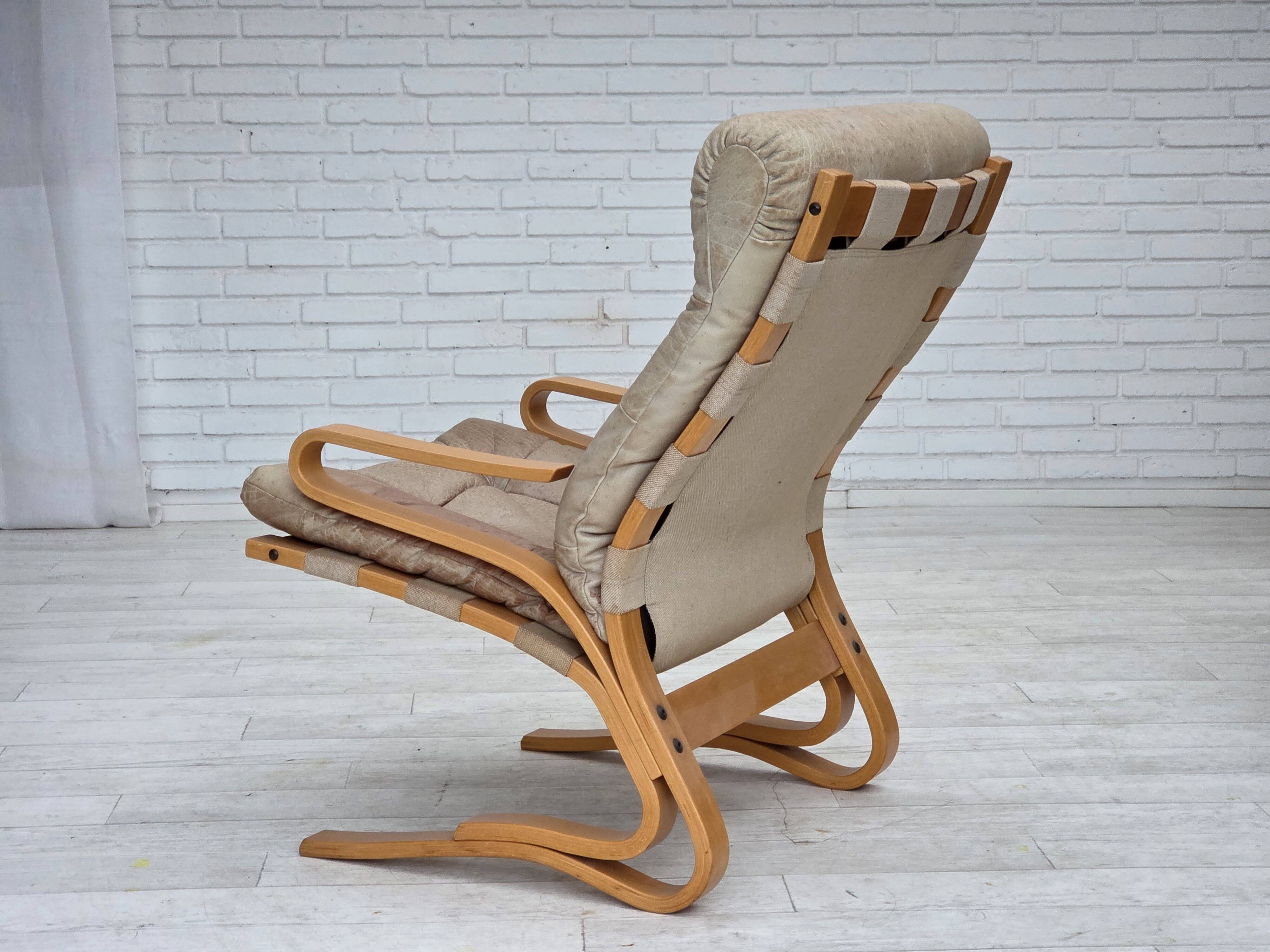1970s, Norwegian armchair, model "Kengu", beige furniture leather.