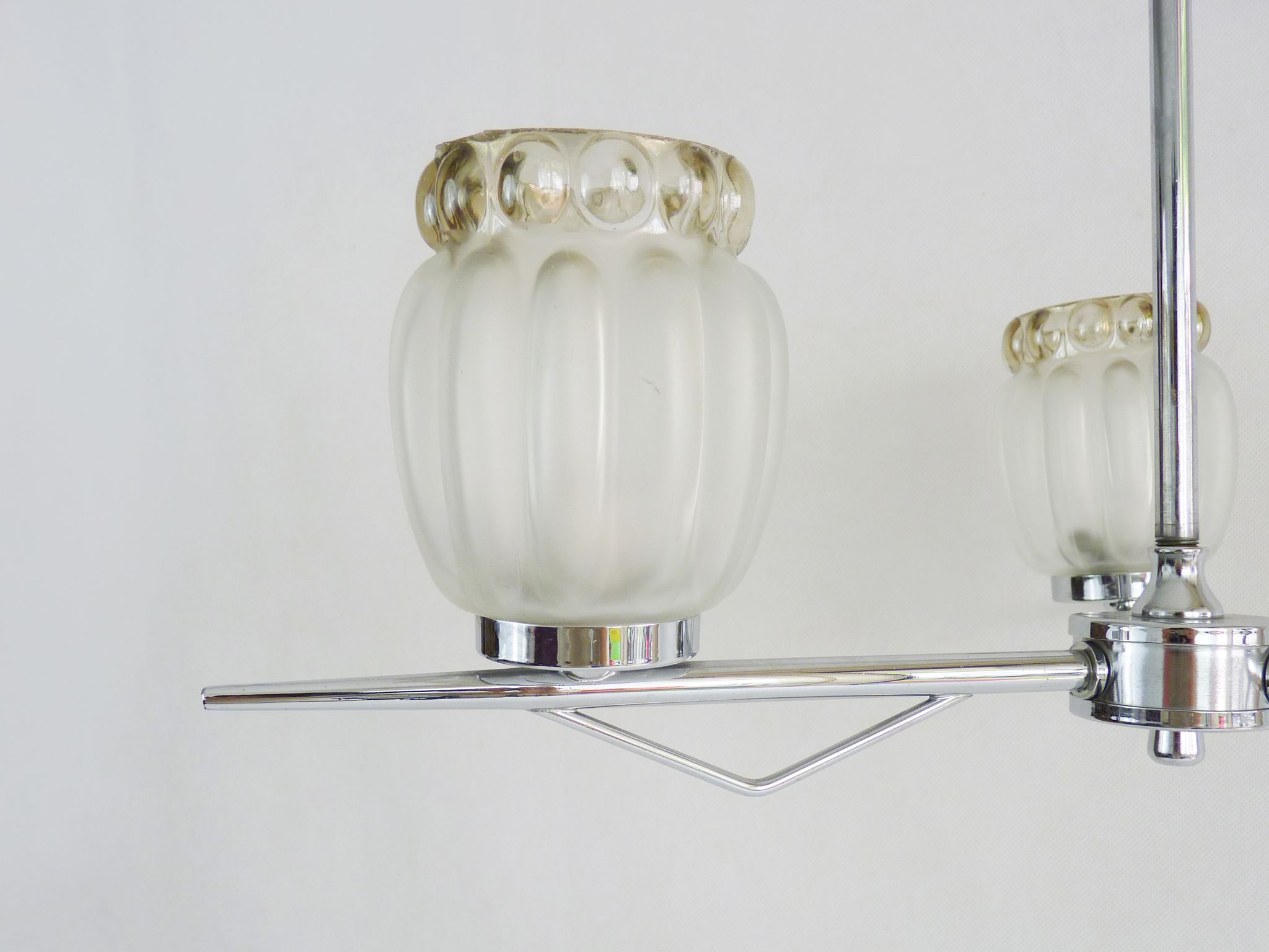 Vintage chandelier with 3 branches in chrome metal and glass globe. Year 70