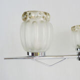 Vintage chandelier with 3 branches in chrome metal and glass globe. Year 70