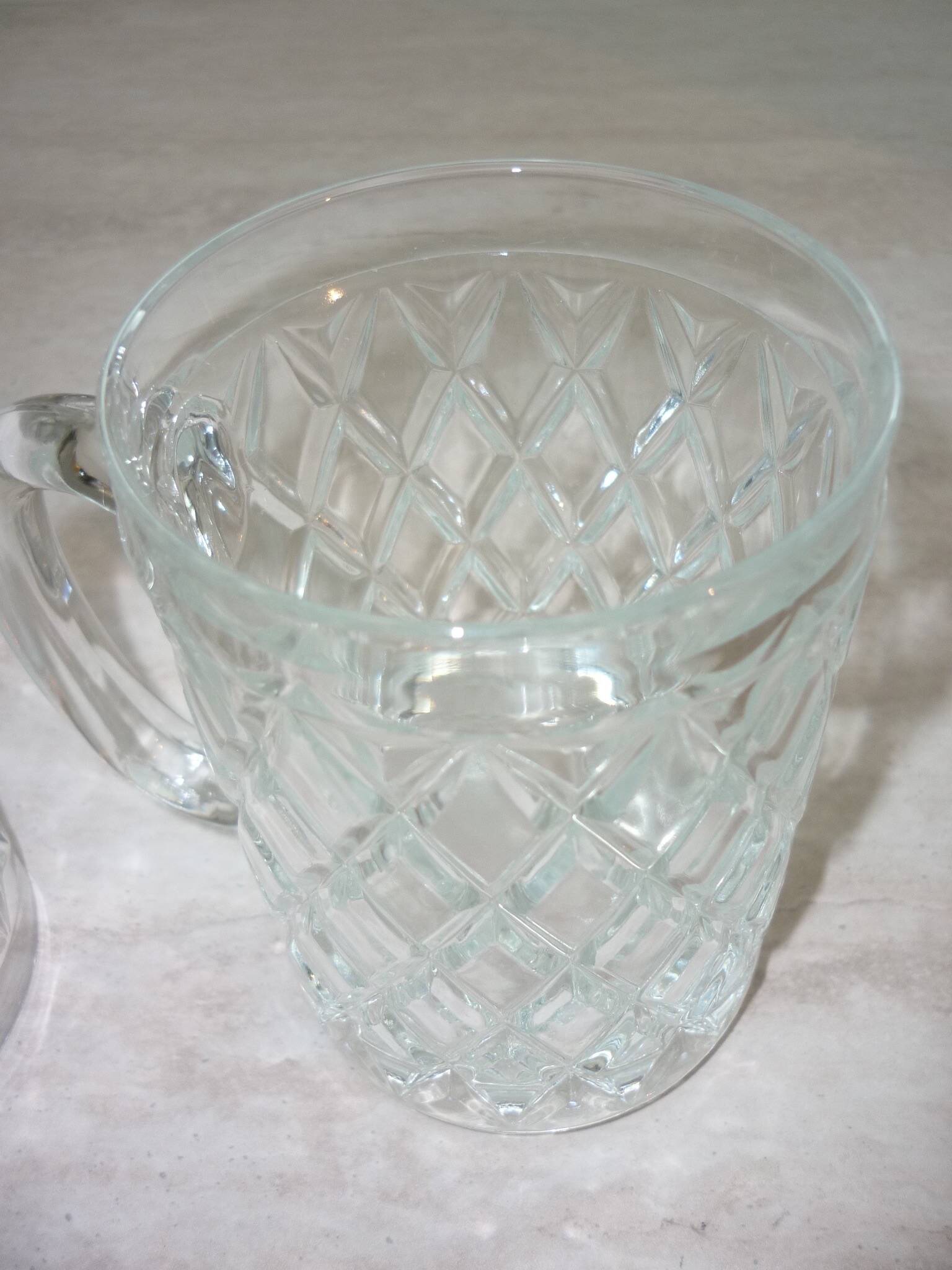 2 diamond-shaped glass beer mugs/glasses