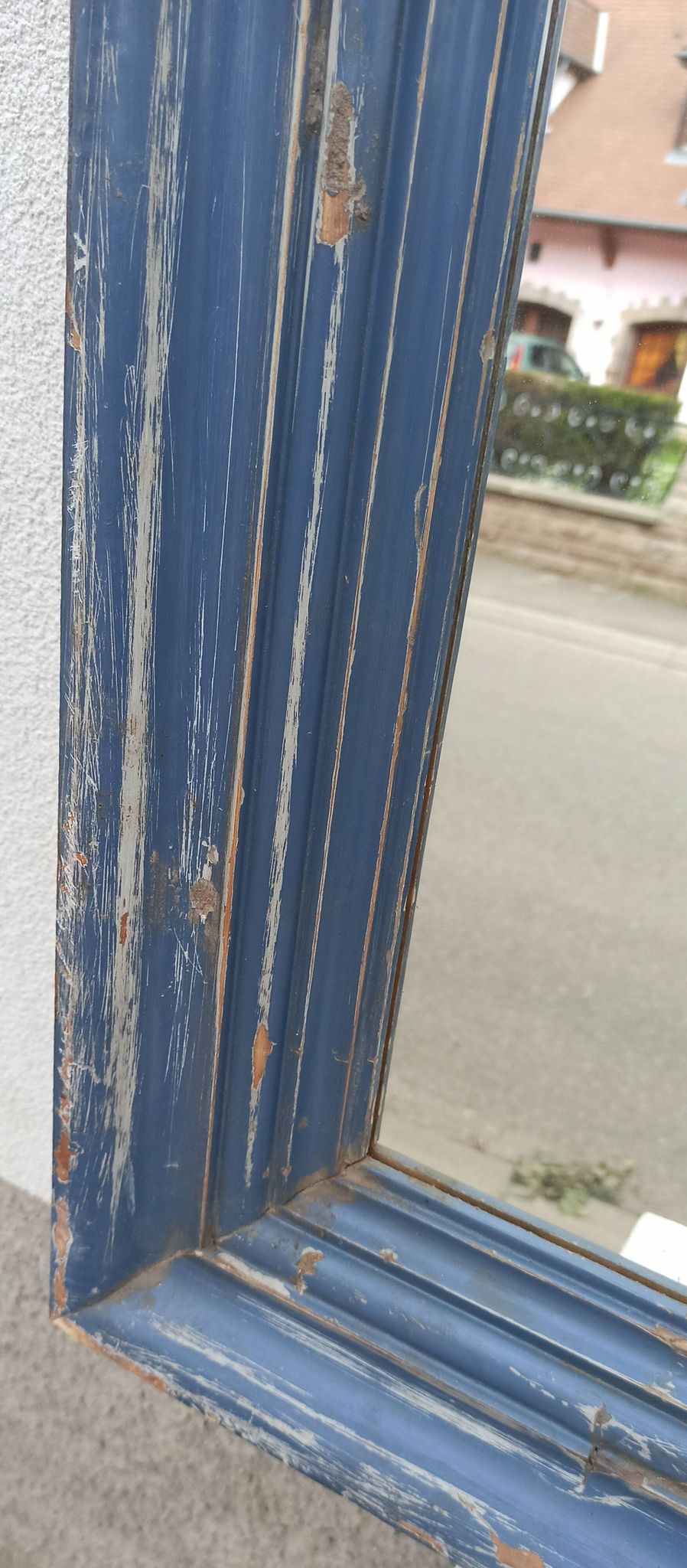 Old blue wooden mirror