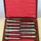 Coffret de 12 couteaux en métal argenté