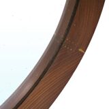 Round mirror with leather strap, 1960s