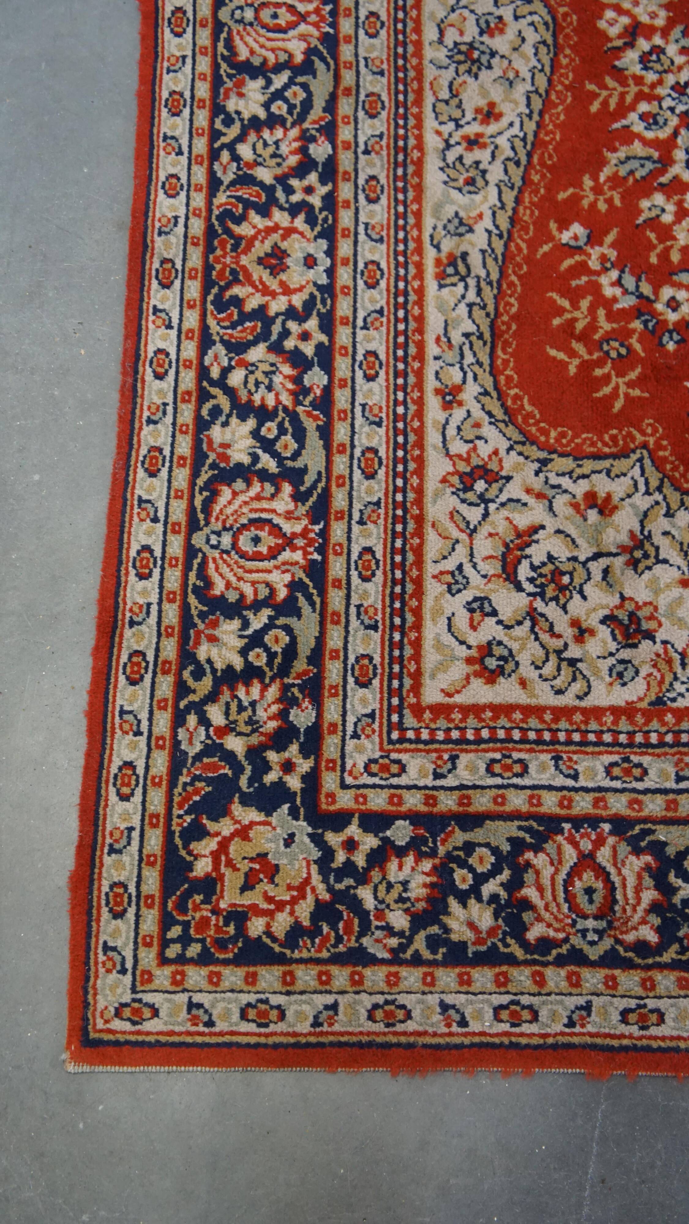 Vintage oriental rug in predominantly red/beige tones with a stunning pattern, 236x170 cm