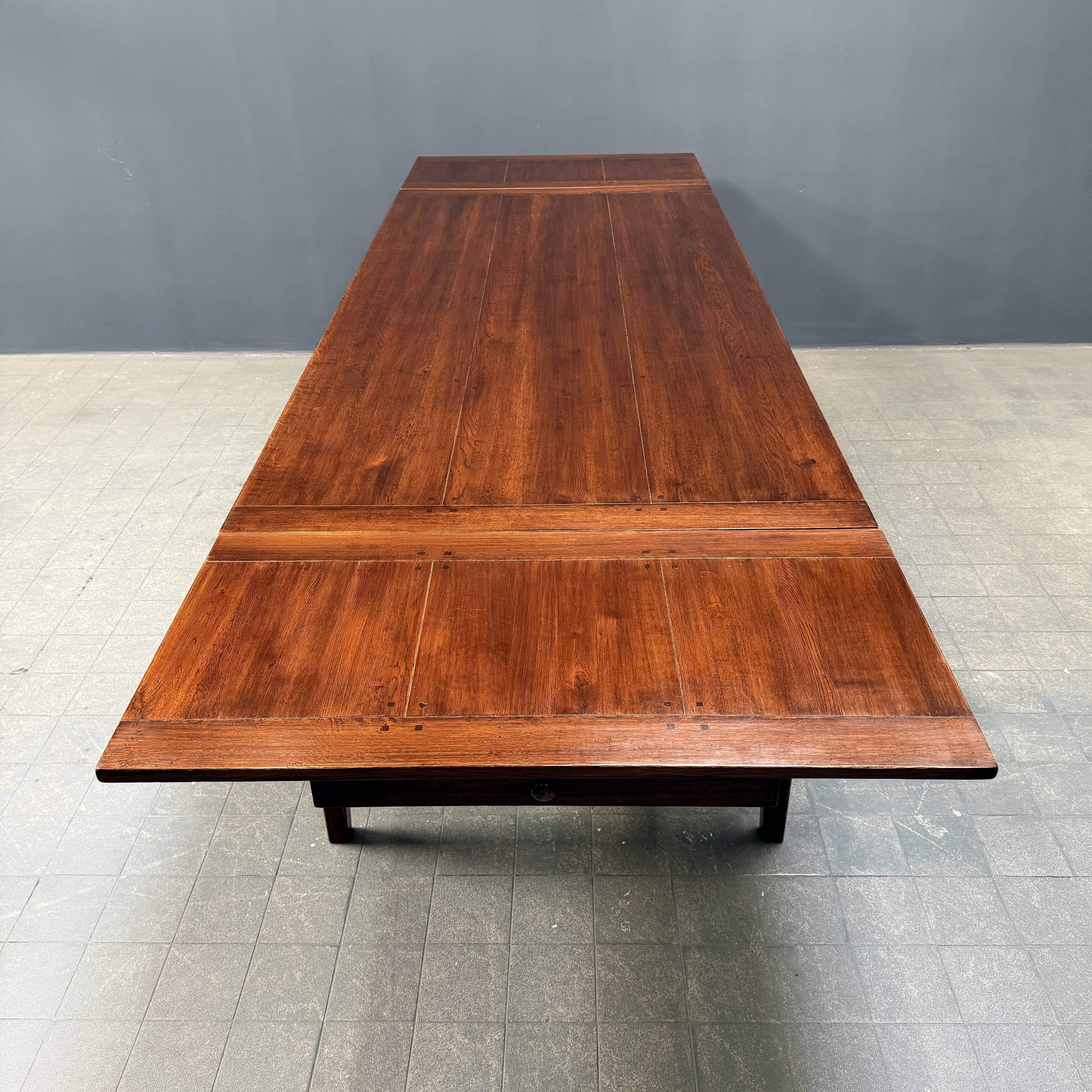 Large antique style oak extendable dining table