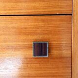 Mid-century brown teak chest of drawers with three drawers, tapered legs from the 1960s.