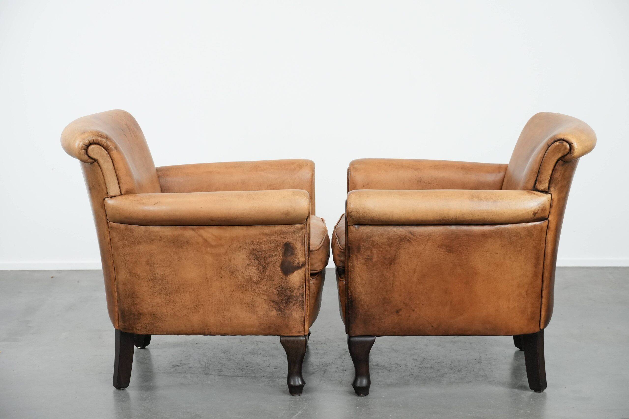 2 fauteuils vintage en cuir de mouton
