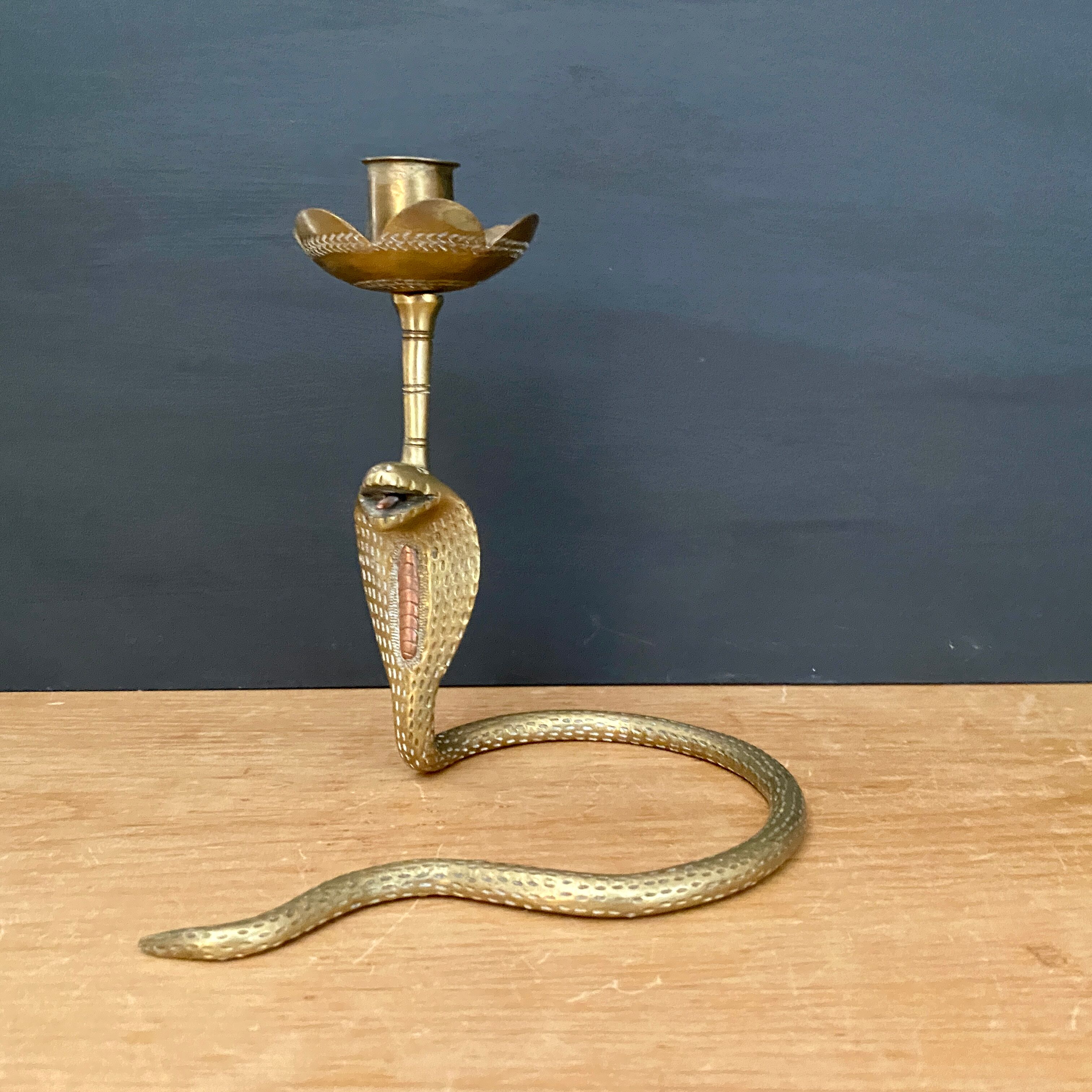 Brass candle holder in the shape of cobra -snake