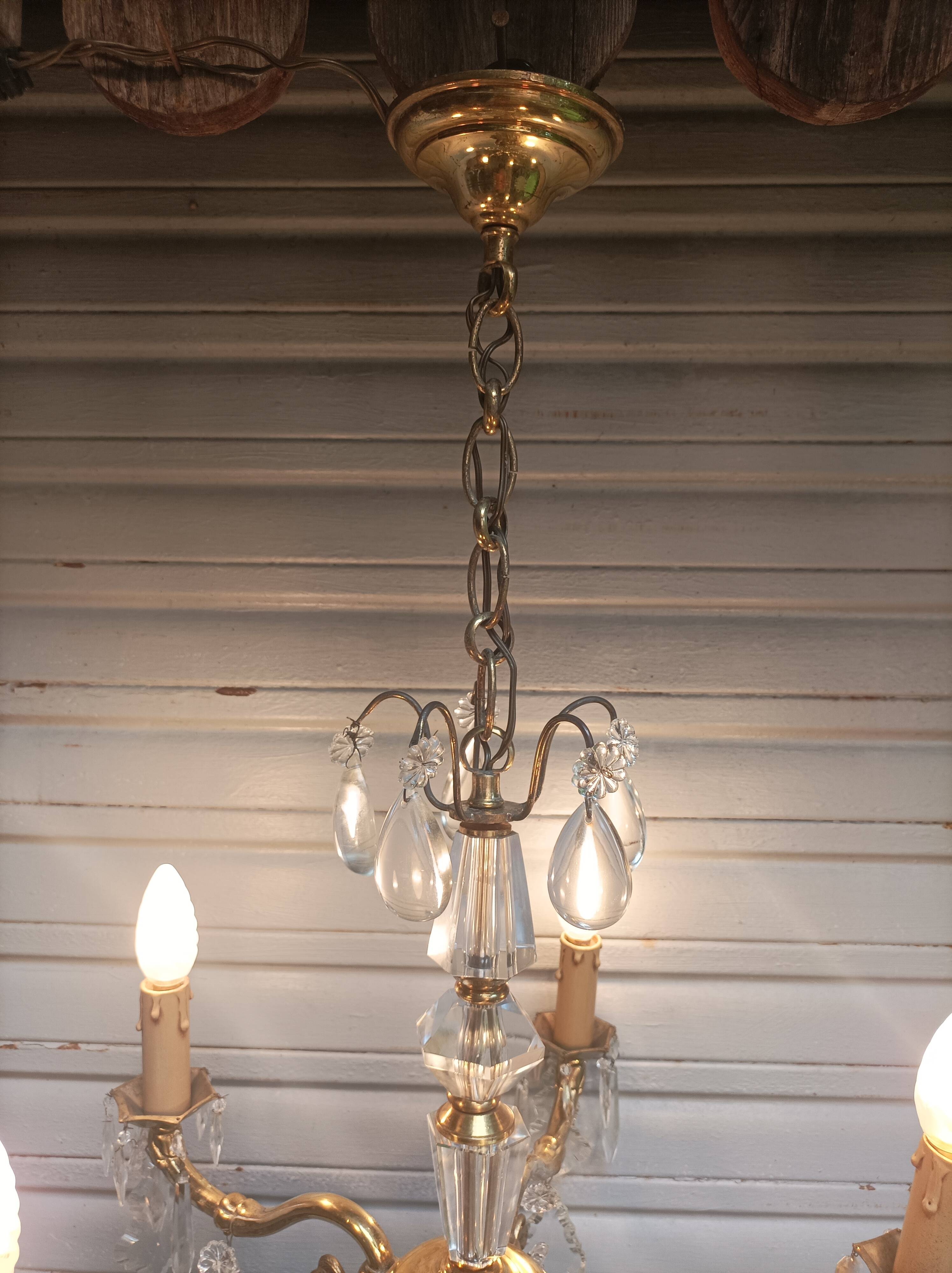 Exceptional bronze chandelier with crystal pendants in working order circa 1910