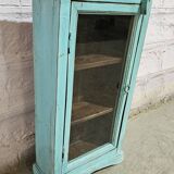 Turquoise showcase in Burmese teak