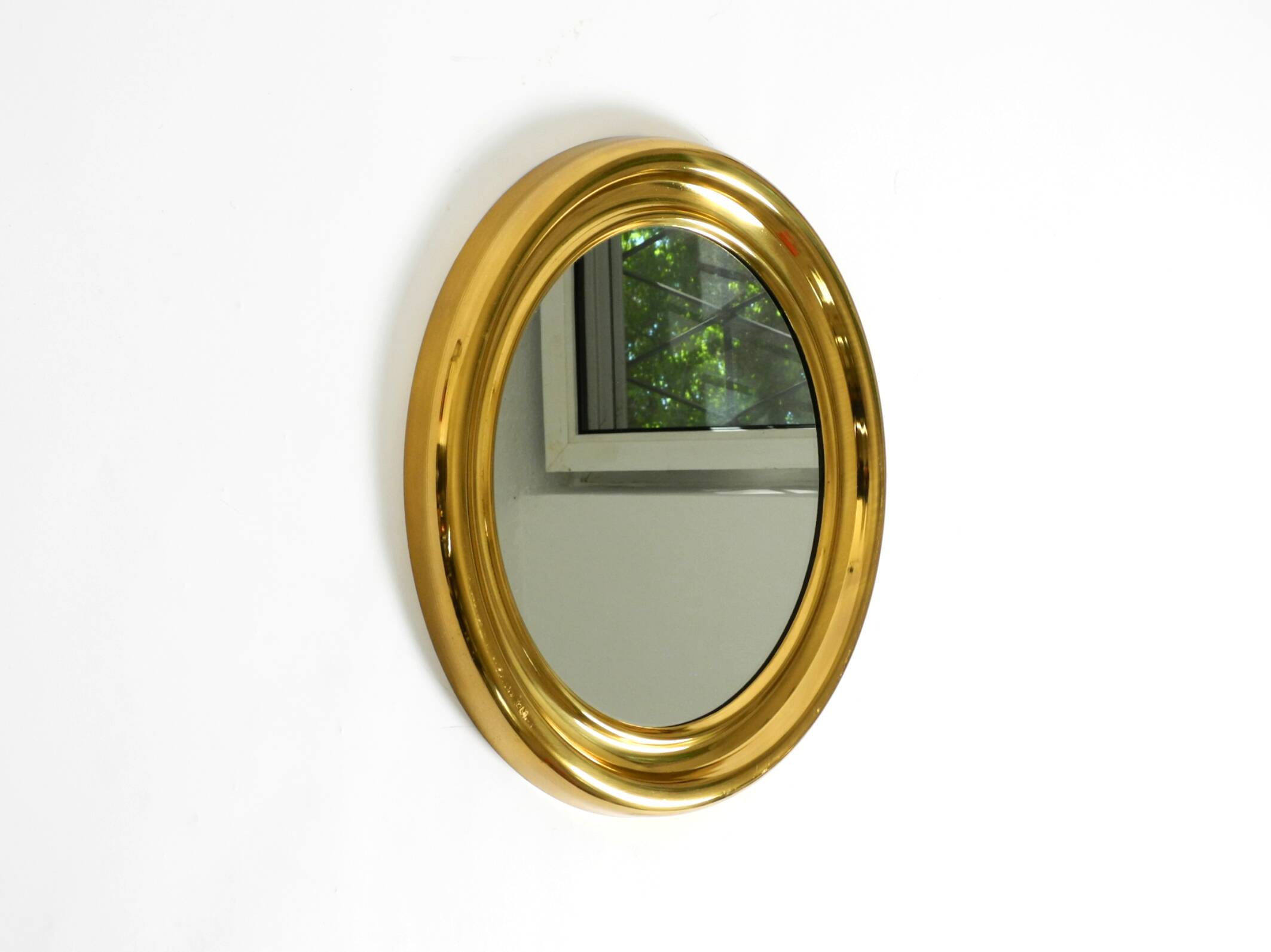 Beautiful, heavy, round Italian brass mirror from the 1960s