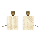 Pair of solid travertine table lamps with incised decoration, French production.