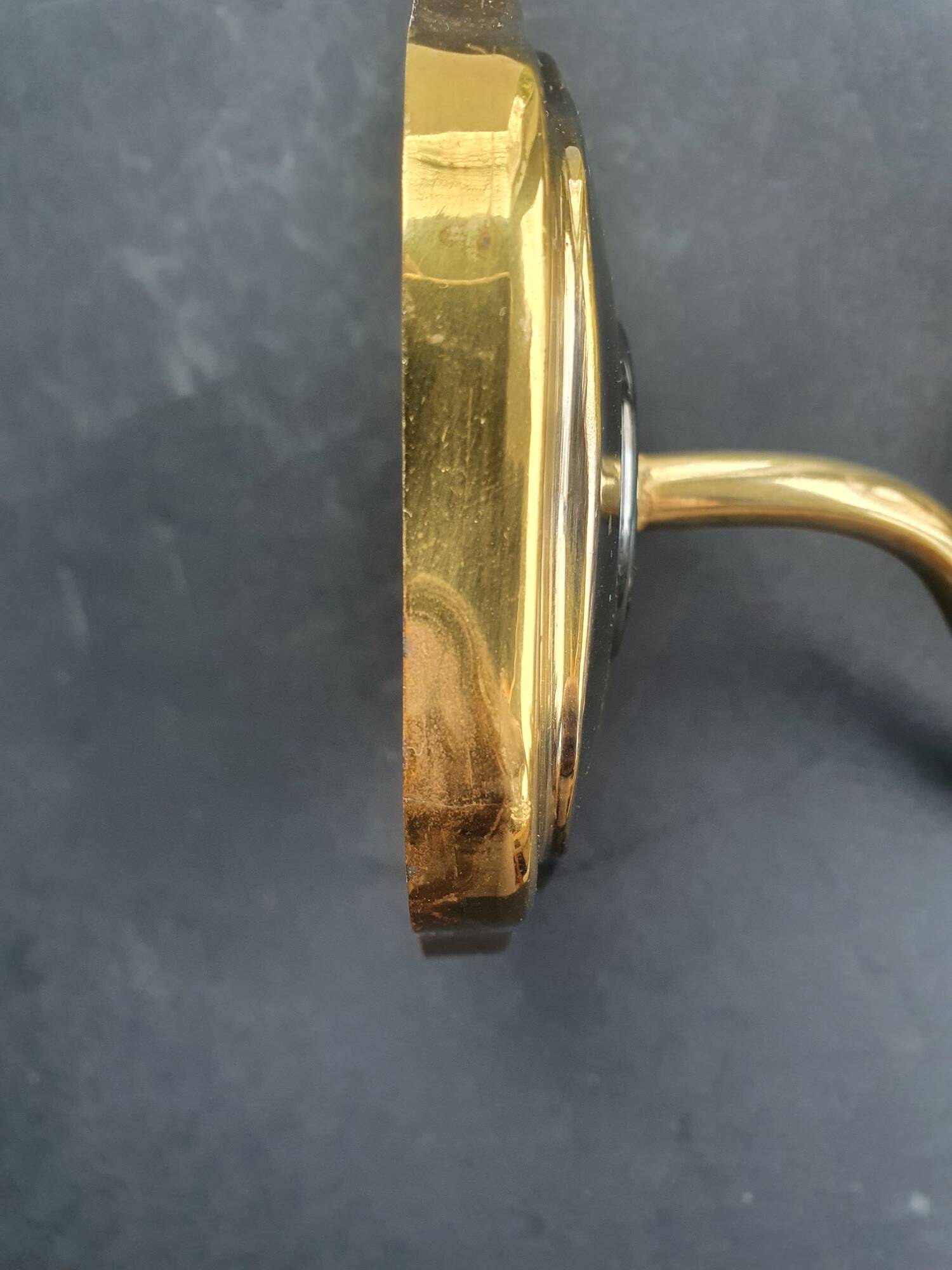 Pair of antique gold-plated brass and smoked glass wall lights.