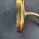 Pair of antique gold-plated brass and smoked glass wall lights.