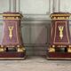 Pair of plaster bases imitating porphyry and gilded bronze circa 1980.