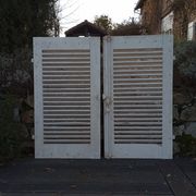 Pair of tropical wood shutters