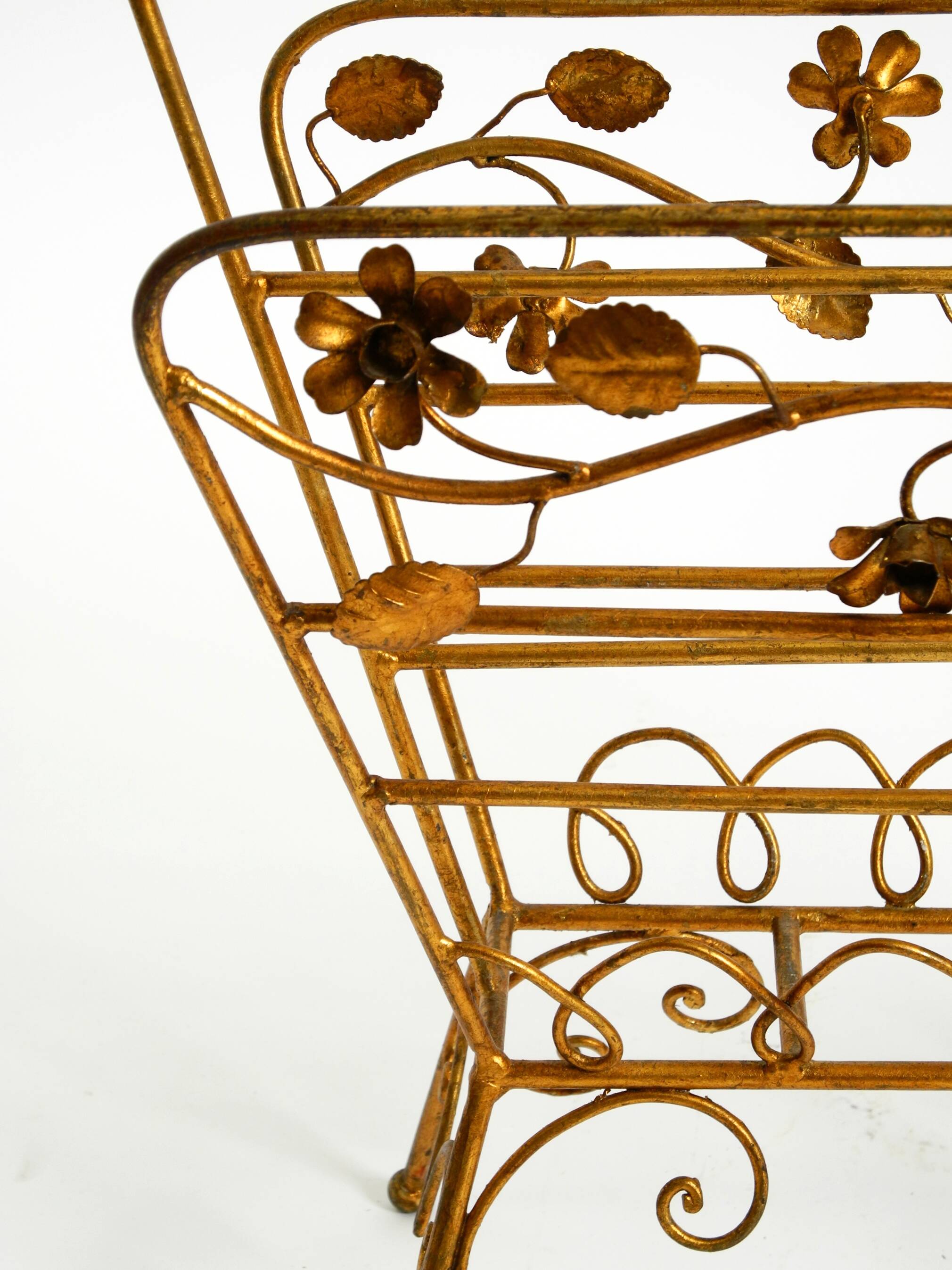 Extraordinary mid-century newspaper and magazine rack with a gilded metal