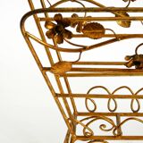 Extraordinary mid-century newspaper and magazine rack with a gilded metal