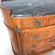 The demi-lune commode/ chest of drawers