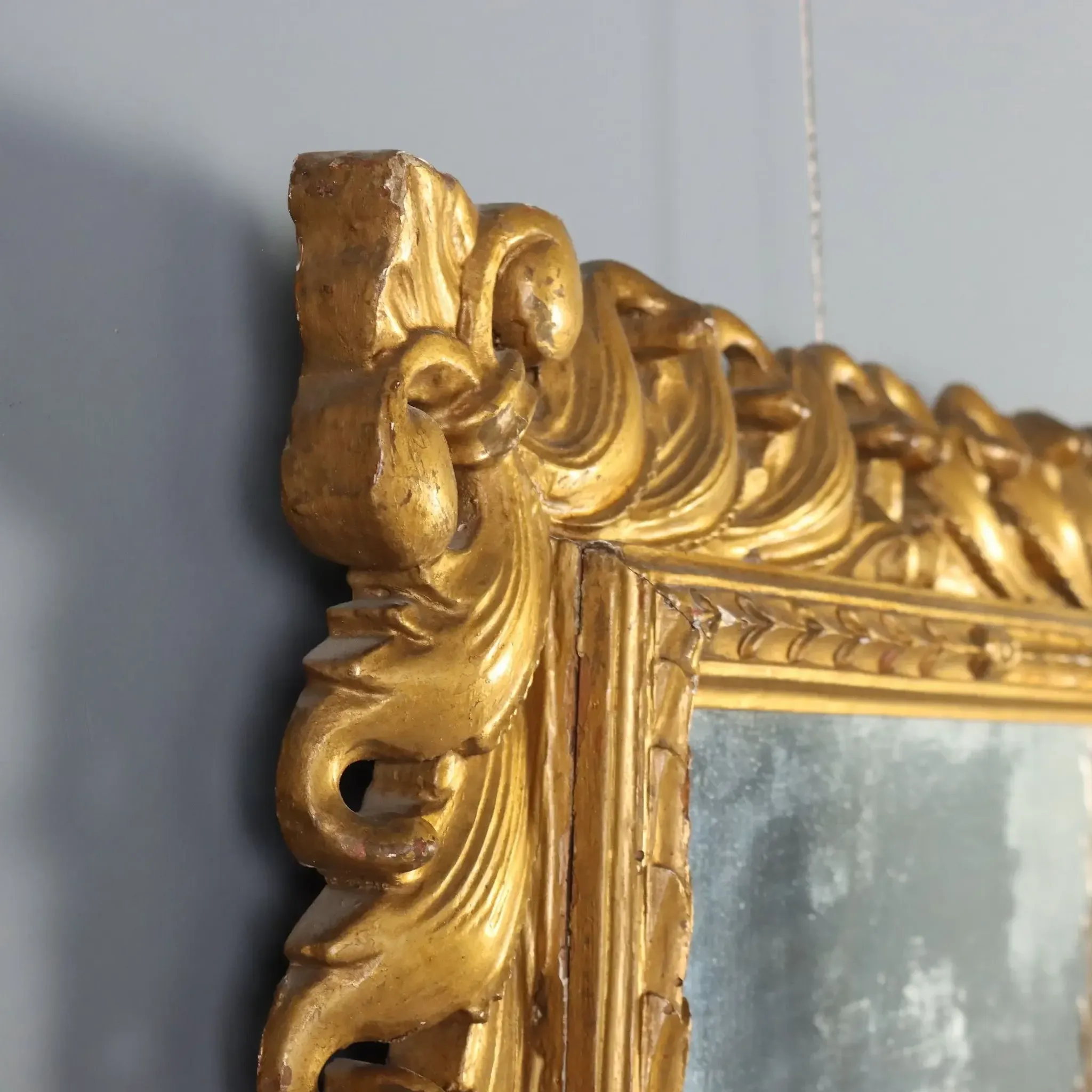Eclectic antique mirror in carved and gilded wood, Italy, 20th century