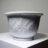 Antique cache-pot in Limoges porcelain with a relief decoration of foliage.
