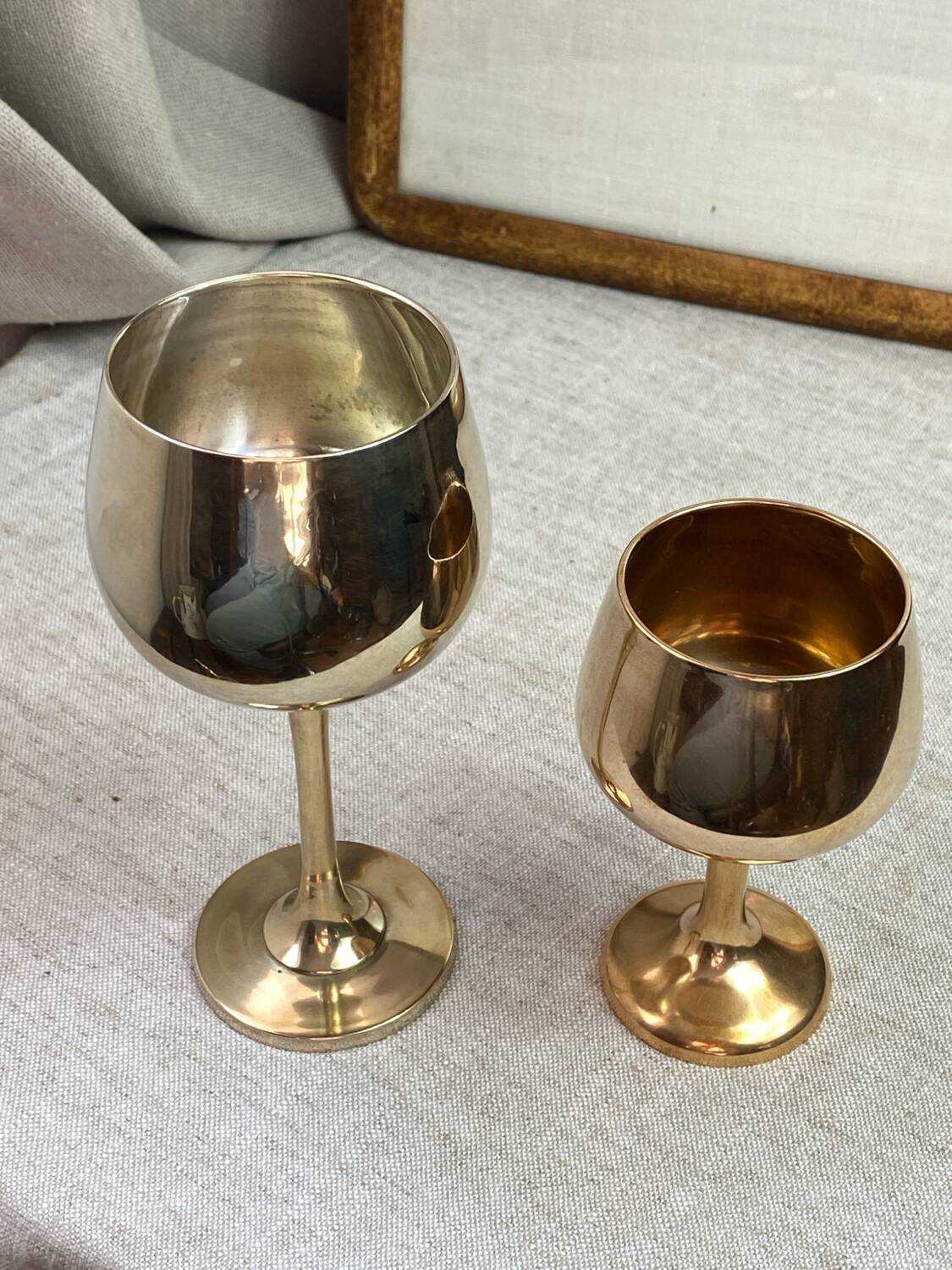 Green stemmed, brass chalices