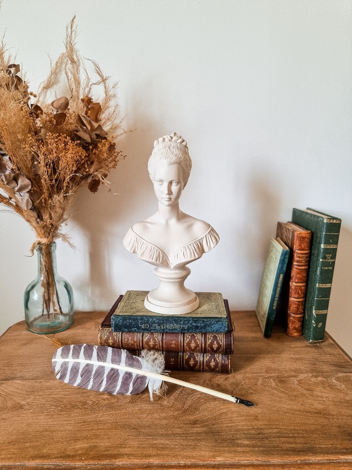 Resin women's bust, signed F.G.