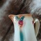 Antique slipware milk jug