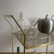 Vintage rolling service in gilded metal and smoked glass