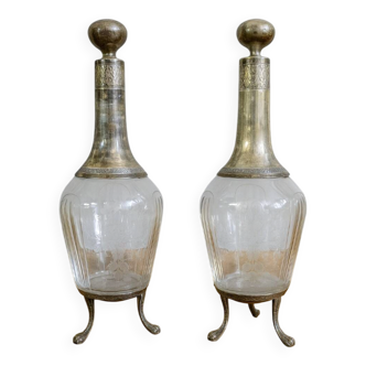 Pair of antique crystal and solid silver decanters.