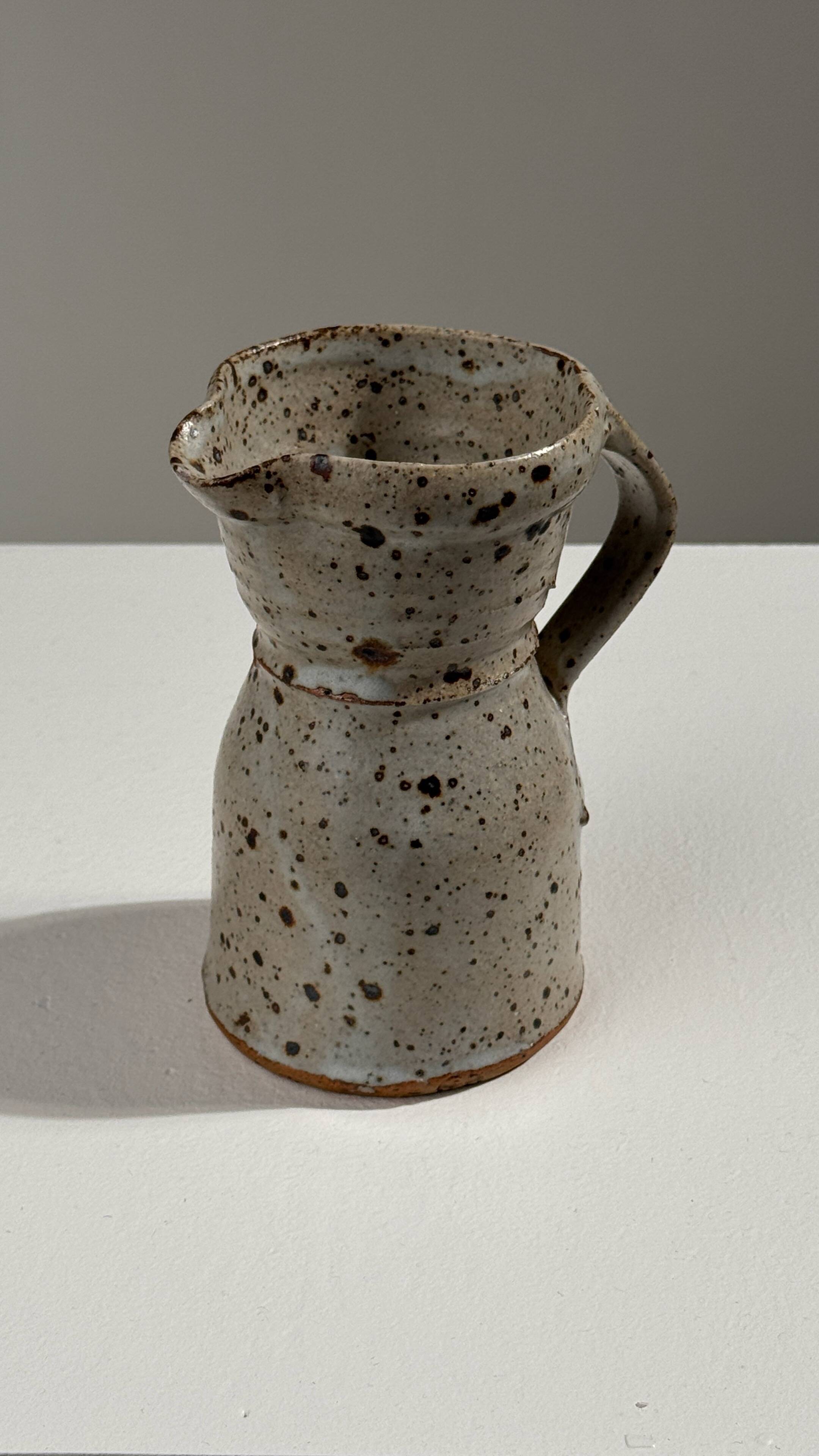 Small stoneware jug by Gustave Tiffoche