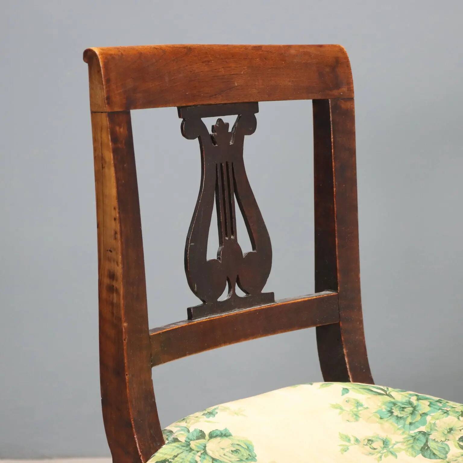Pair of antique Directoire chairs in walnut and fabric, Italy, 19th century.