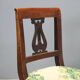 Pair of antique Directoire chairs in walnut and fabric, Italy, 19th century.