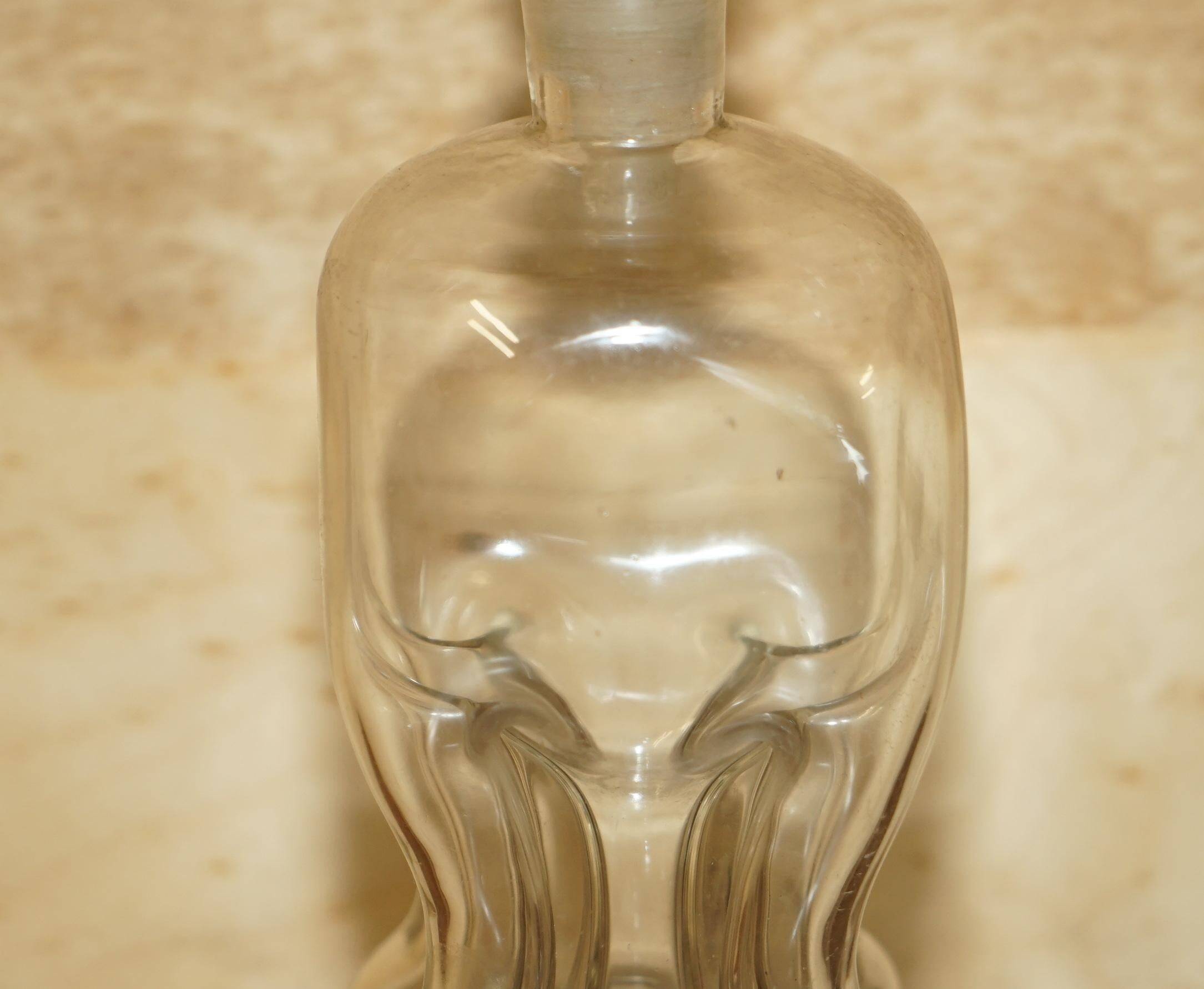 Pair of antique pinched decanters circa 1900 for serving whisky, bourbon, vodka, gin.